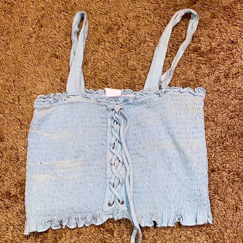 A blue form fitting crop top